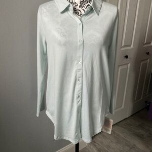 Light powder green, button down, long sleeve shirt.
